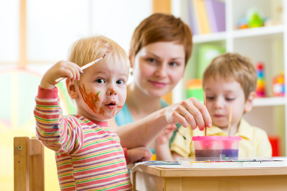 Click the Investing in the Future: Grow Spink Tackles Child Care Challenges slide photo to open